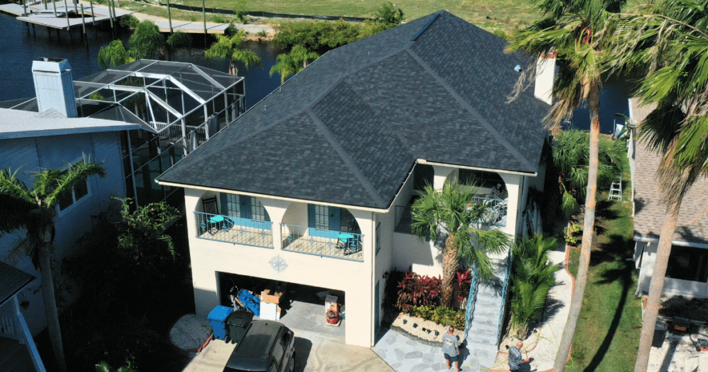 sleek shingle roof on two story house